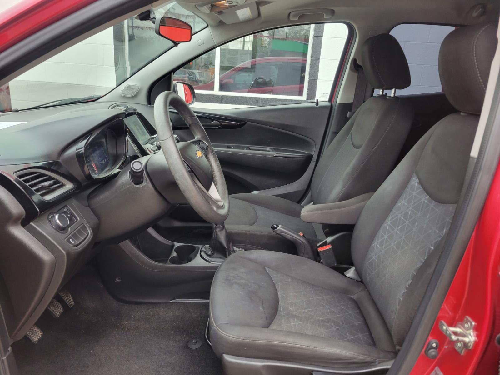 2020 Red Chevrolet Spark 1LT Manual (KL8CC6SA6LC) with an 1.4L L4 16V DOHC engine, 5 Speed Manual transmission, located at 503 West Court, Seguin, TX, 78155, (830) 379-3373, 29.568621, -97.969803 - 2020 Chevrolet Spark 1LT Manual with a 1.4L L4 16V DOHC, Standard Transmission, Tilt, Cruise, AM/FM Touchscreen Stereo, Power Windows, Locks and Side Mirrors, Bluetooth, Automatic Headlights, Tinted Windows, Alloy Wheels, Rear Wiper, Rear Defroster and more!! - Photo #4